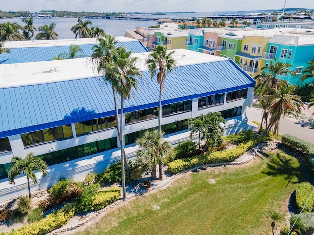 drone / aerial view with a water view