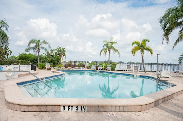 view of pool featuring a patio