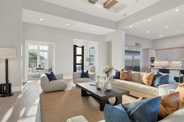 living room with a high ceiling