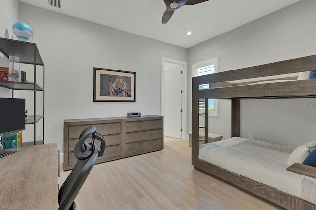 bedroom featuring ceiling fan and light hardwood / wood-style floors