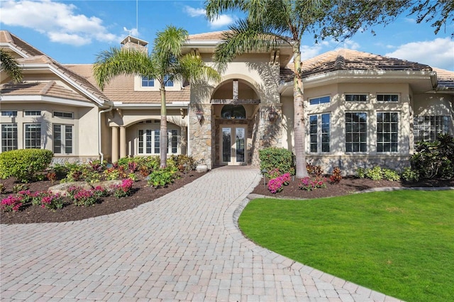 view of front facade featuring a front yard