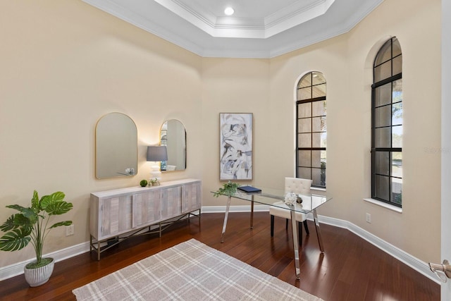 office area featuring a tray ceiling, crown molding, and dark hardwood / wood-style floors