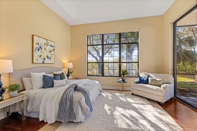 bedroom with hardwood / wood-style flooring