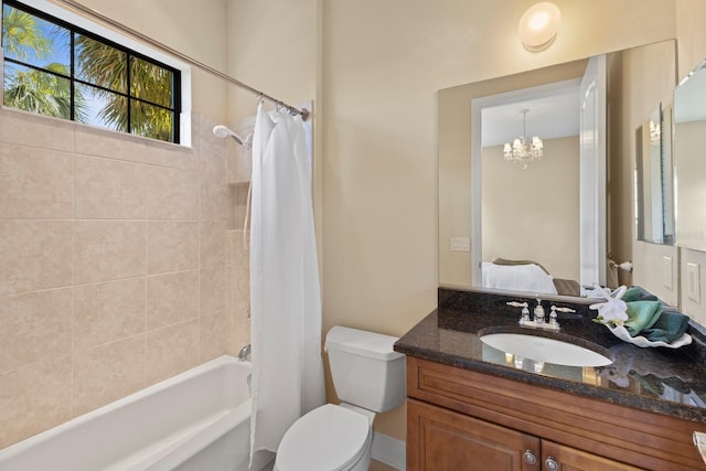 full bathroom with vanity, toilet, and shower / bath combo with shower curtain