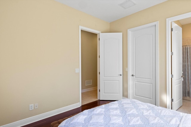 bedroom featuring hardwood / wood-style flooring