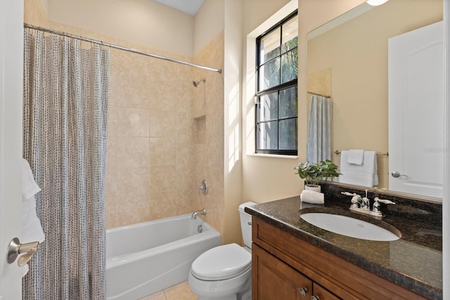 full bathroom featuring shower / bathtub combination with curtain, vanity, tile patterned floors, and toilet