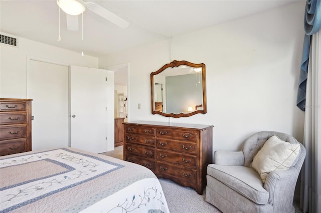 bedroom with light carpet and ceiling fan