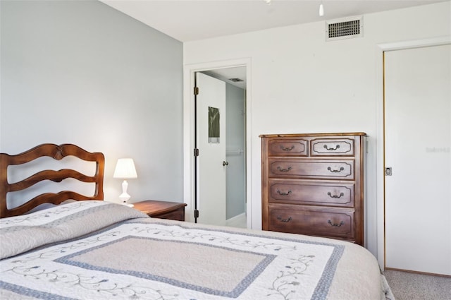 bedroom featuring carpet