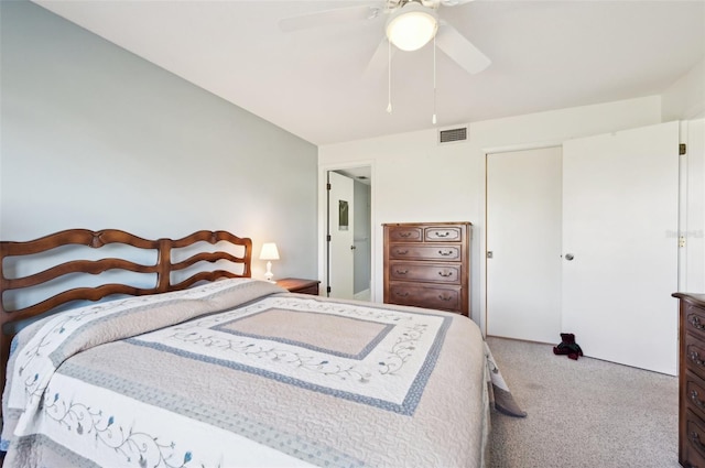 carpeted bedroom featuring ceiling fan