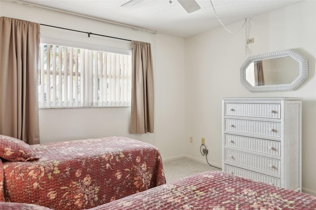 bedroom featuring carpet and ceiling fan