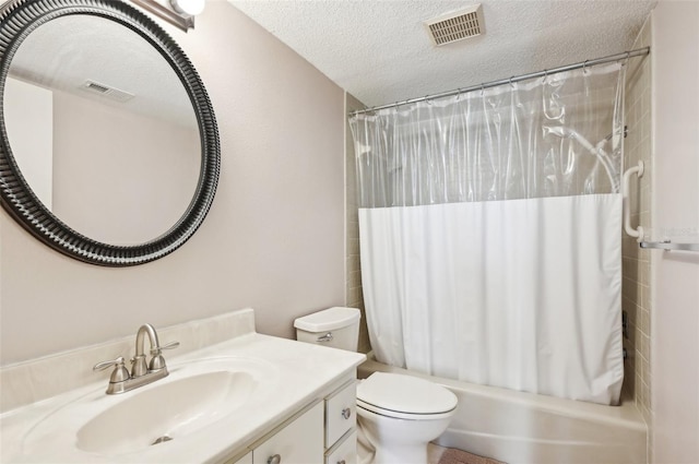 full bathroom with shower / tub combo with curtain, vanity, a textured ceiling, and toilet