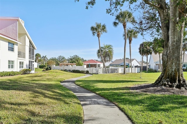 surrounding community featuring a lawn