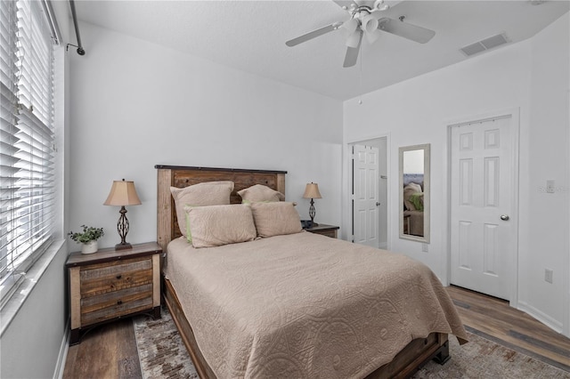 bedroom featuring ceiling fan and hardwood / wood-style floors