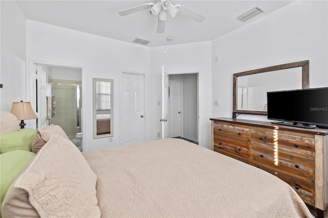 bedroom with ceiling fan and connected bathroom