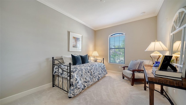 carpeted bedroom featuring crown molding