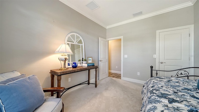 bedroom featuring light colored carpet and crown molding