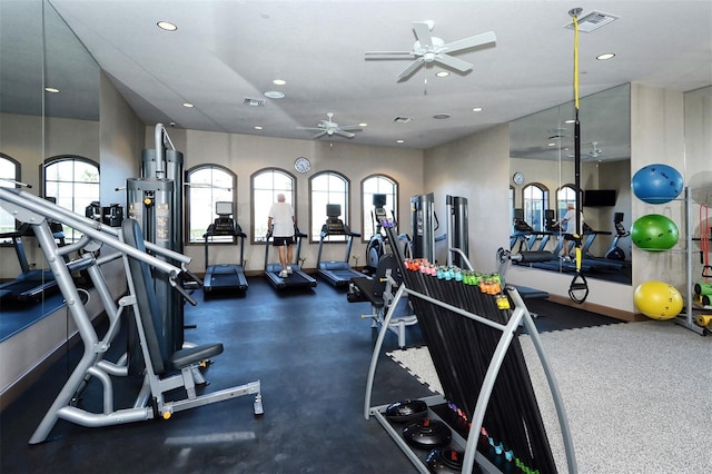 workout area with ceiling fan