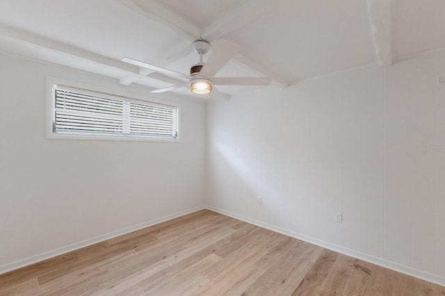 unfurnished room featuring light wood finished floors, ceiling fan, and baseboards