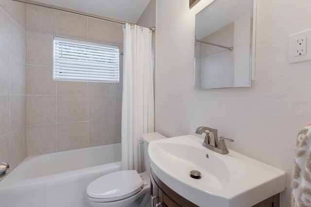 bathroom featuring toilet, shower / bathtub combination with curtain, and vanity