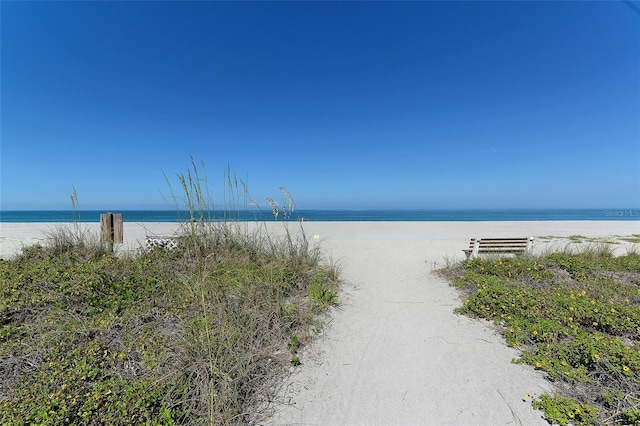 view of water feature with a beach view