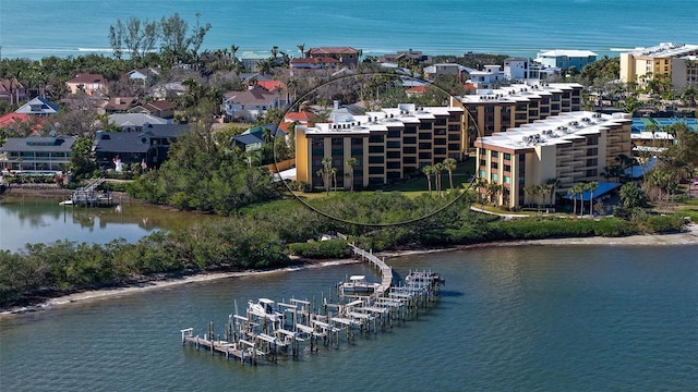 birds eye view of property featuring a water view