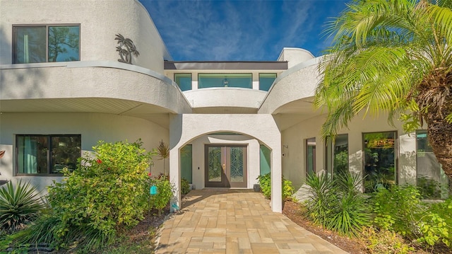 entrance to property featuring a balcony