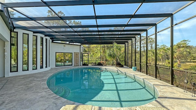 view of pool featuring a lanai and a patio area