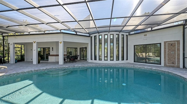 view of pool featuring a lanai and a patio