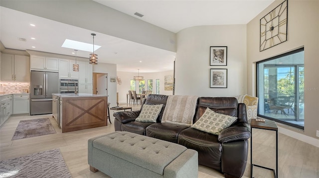 living room with a skylight