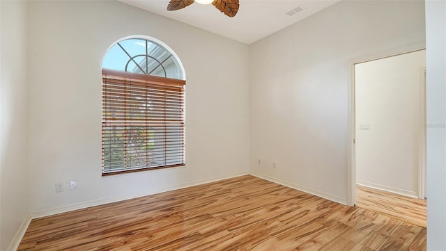 unfurnished room featuring light hardwood / wood-style flooring and ceiling fan