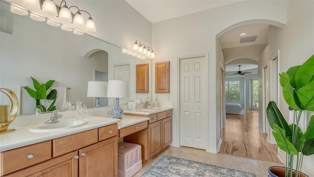 bathroom featuring vanity, tile patterned floors, and ceiling fan