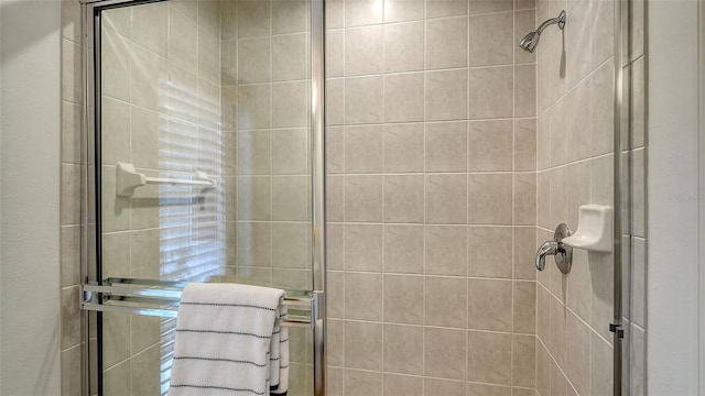 bathroom featuring an enclosed shower