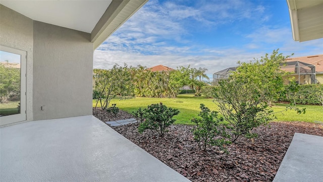 view of patio / terrace with glass enclosure