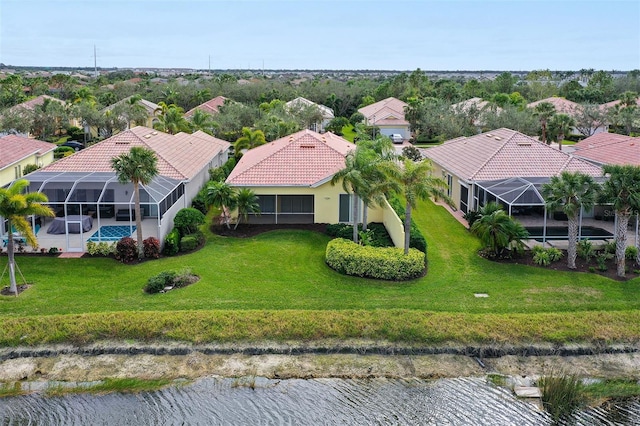 bird's eye view with a water view