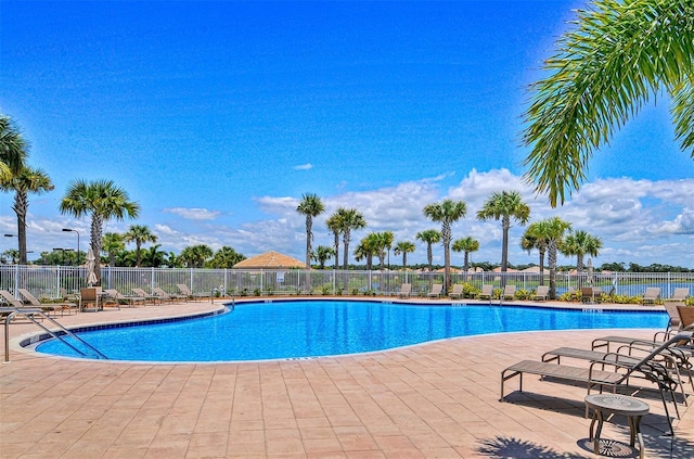 view of pool featuring a patio area