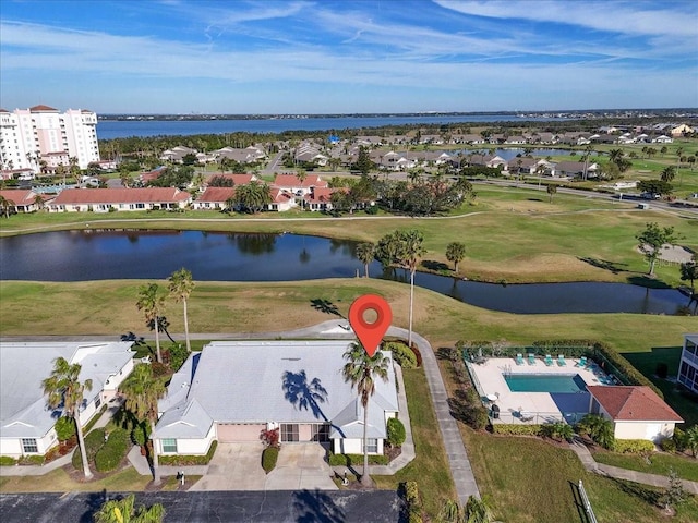 bird's eye view with a water view