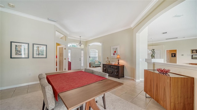 tiled dining area with crown molding