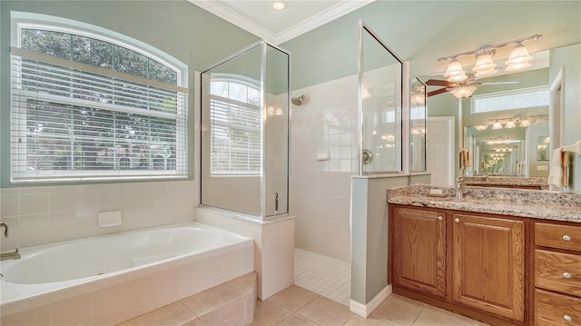 bathroom featuring tile patterned floors, vanity, ceiling fan, crown molding, and shower with separate bathtub