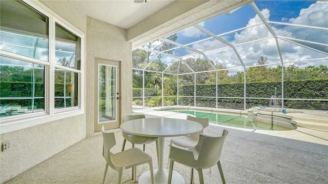 view of patio / terrace featuring a lanai