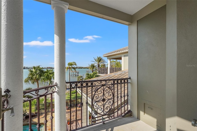 balcony featuring a water view