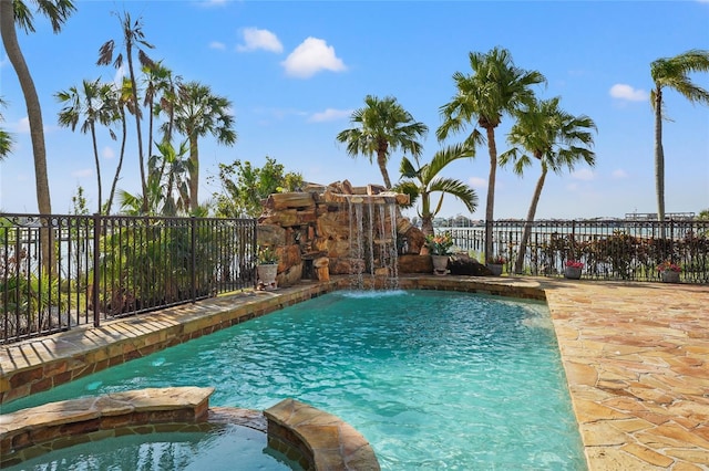 view of pool featuring pool water feature