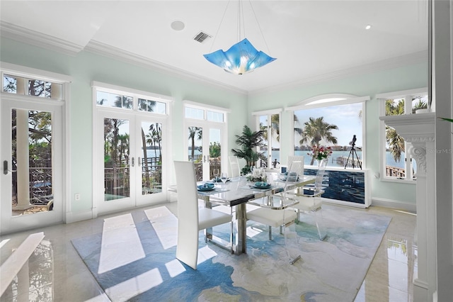 sunroom featuring french doors and a healthy amount of sunlight