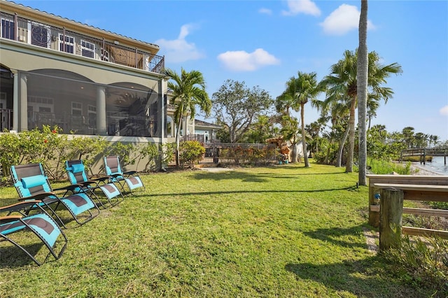 view of yard with a sunroom