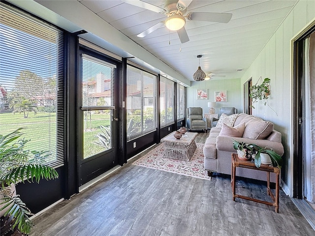 sunroom / solarium with ceiling fan