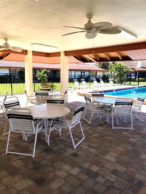 view of patio with a community pool