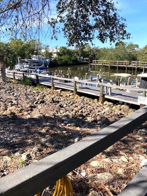 view of dock with a water view