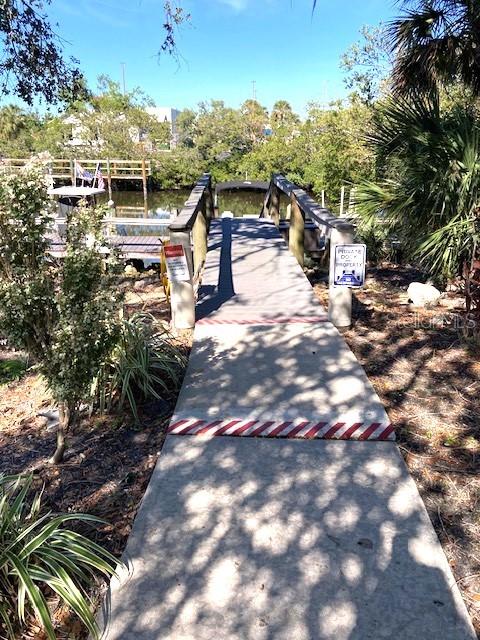 exterior space with a boat dock and a water view