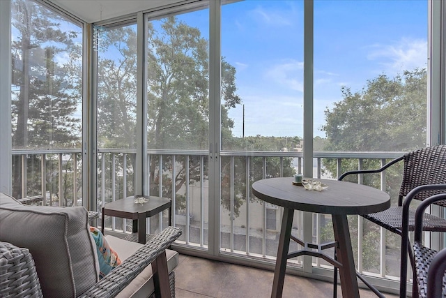 sunroom / solarium featuring plenty of natural light