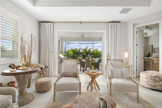 sitting room with light tile patterned floors