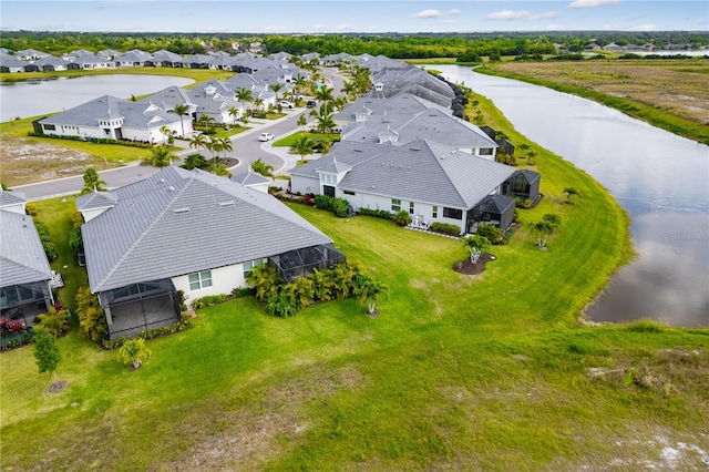 drone / aerial view featuring a water view